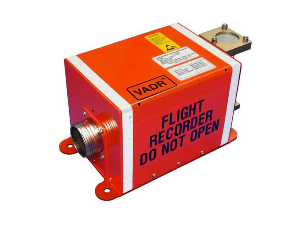 A traditional black box flight recorder, a device commonly used in commercial aviation. Some regulatory agencies are now evaluating similar flight data recorders for emerging eVTOL aircraft to enhance safety and investigation capabilities.